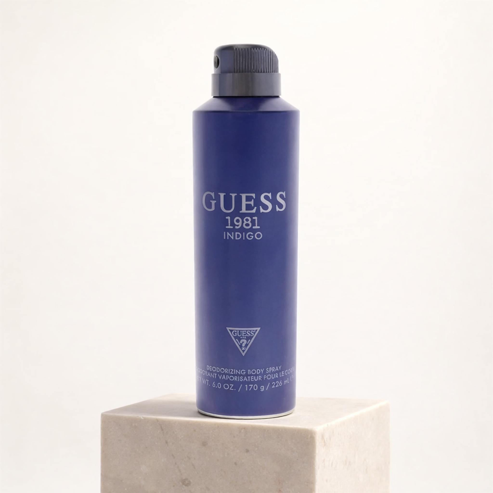Guess 1981 Indigo Body Mist upright pedestal gallery showcase