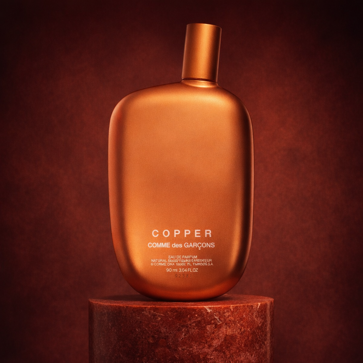 Comme Des Garcons Copper EDP upright pedestal gallery showcase