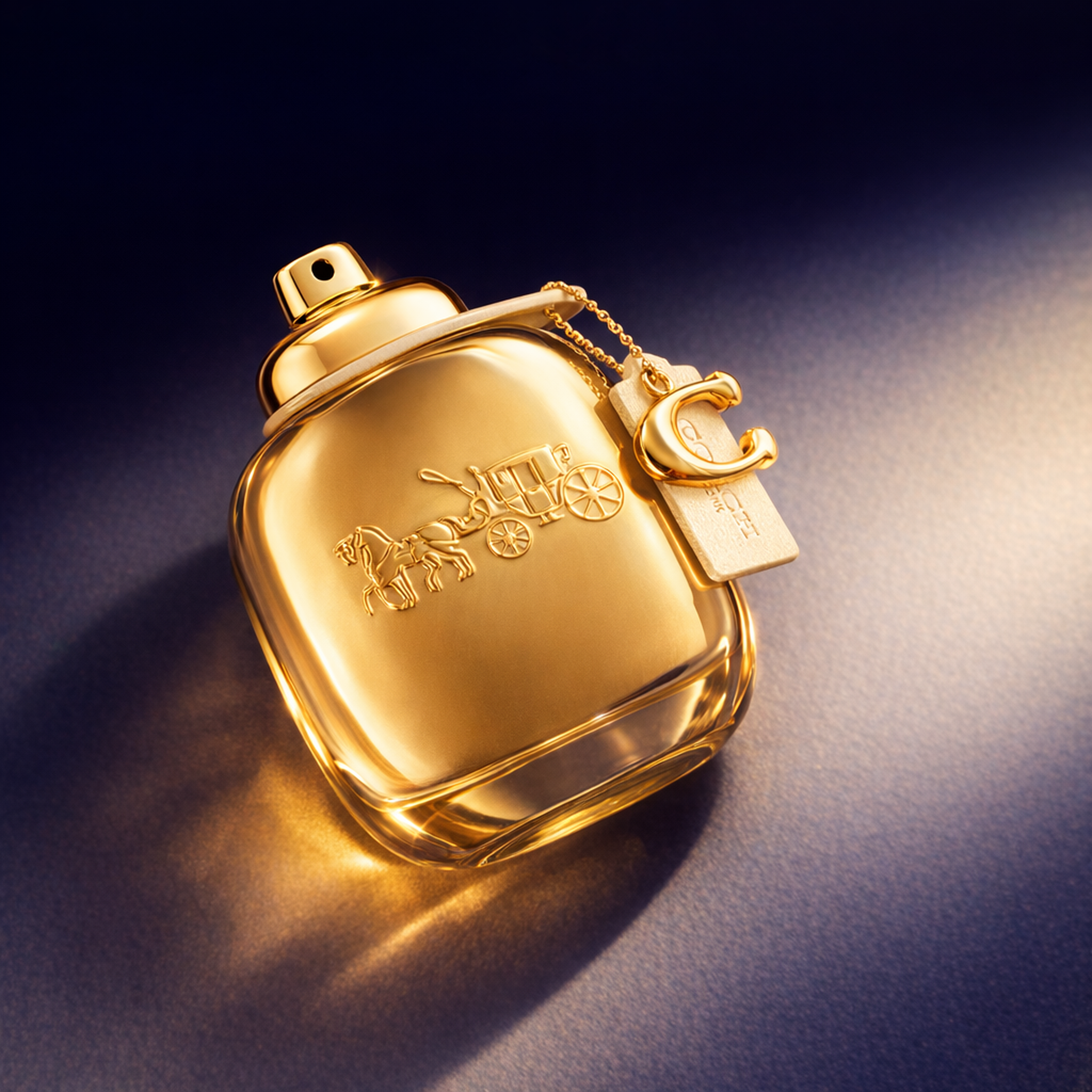 Coach Gold Parfum For Women angled still-life gallery showcase