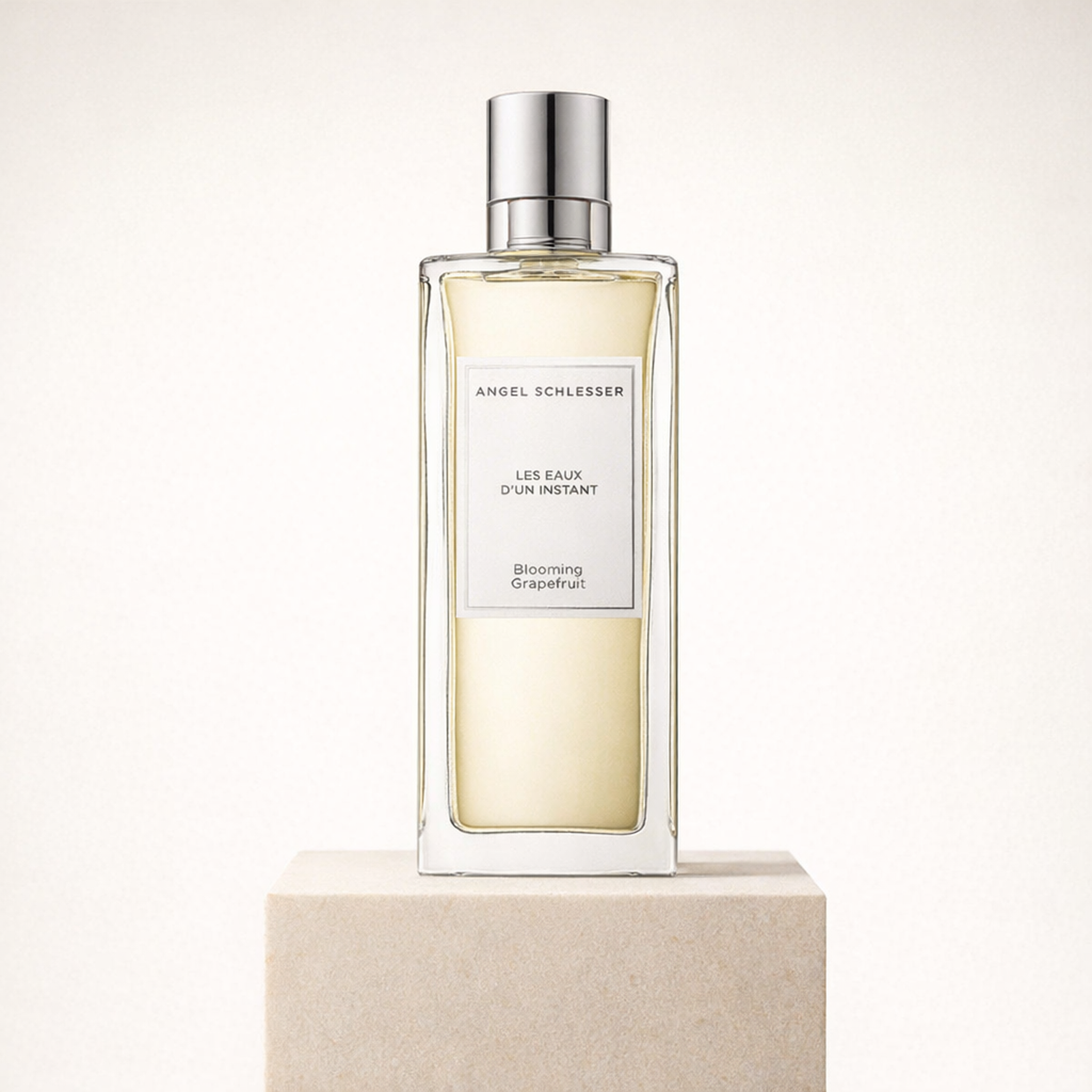 Angel Schlesser les Eaux D'un Instant Blooming Grapefruit EDT upright pedestal gallery showcase